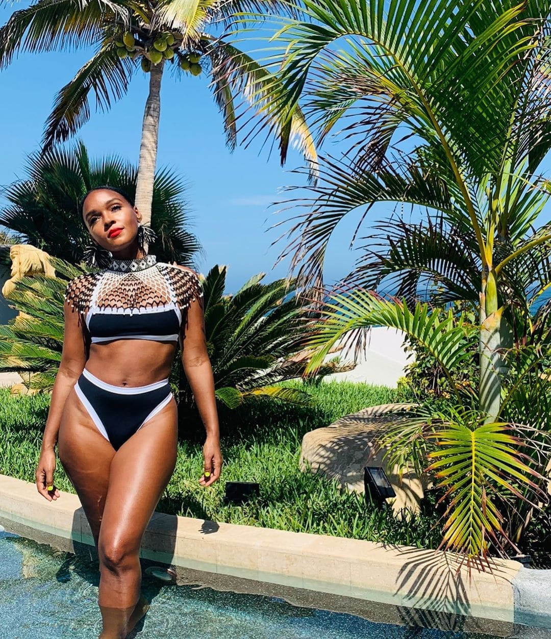 Janelle Monáe looked gorgeous in this intricate black-and-white bikini on J...