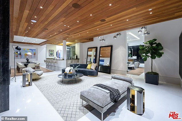 The party house, listed on AirBnb for over $2,000-a-night, is owned by luxury holiday property company Stay Awhile Villas. The company says on the AirBnB listing that its guests 'include some of the most famous film and music personalities, C level executives of Fortune 500 companies, and Royal Families'