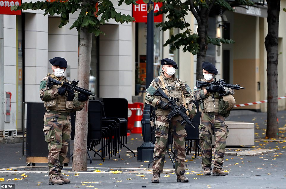 Special forces stand guard near the scene of a reported knife attack at Notre Dame church in Nice