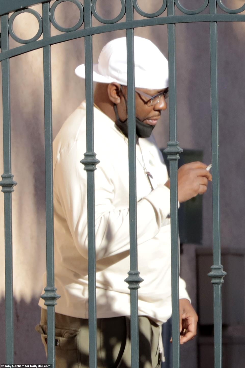 Smoking a cigarette, Bobby Brown has been left devastated at the sudden death of his son who was pronounced dead at his Encino, California apartment on Wednesday at 2pm