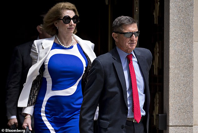 Powell, an attorney for Michael Flynn (right), is a known QAnon conspiracy theorist. It was her representation of Flynn, who pleaded guilty in a plea deal with the Mueller inquiry to lying to the FBI, which propelled her on to the MAGA stage