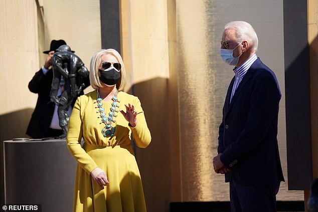 Cindy McCain (left), 66, the widow of the late Senator John McCain, is reported to be the frontrunner for the post of US ambassador to the United Kingdom under incoming President-elect Joe Biden. Biden is seen right with Cindy McCain in Phoenix, Arizona, on October 8