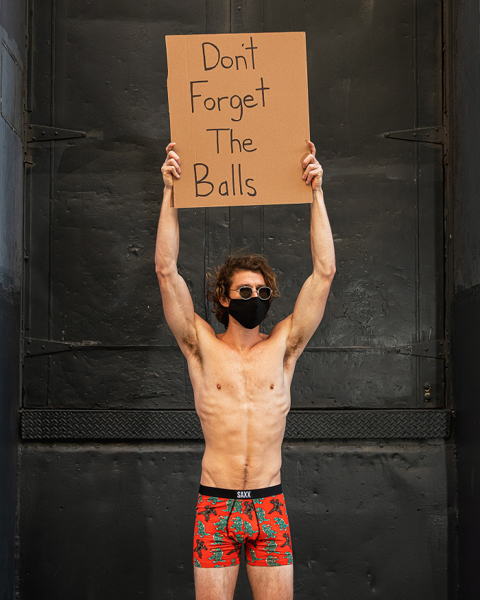 dude-with-sign-saxx
