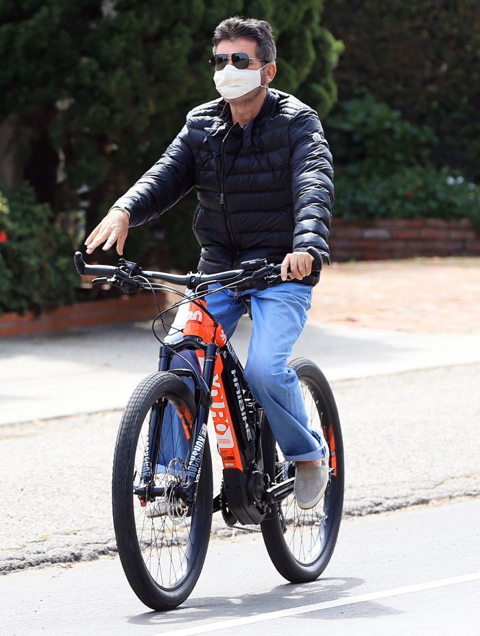 Simon Cowell Riding a Bike in April 2020 Simon Cowell Details Experience Injuring His Back in Bike Accident