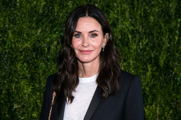 Courteney Cox Eating Her Way Through Disneyland Is Summertime Mood