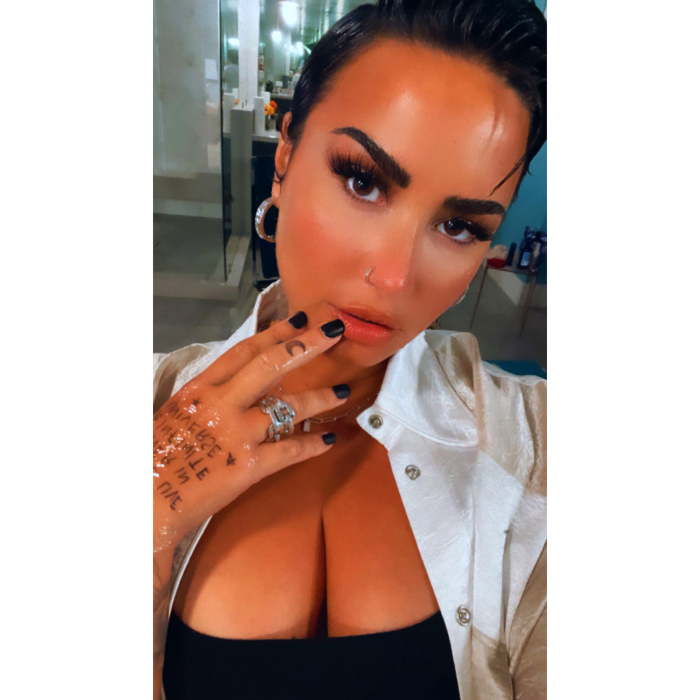 Demi Lovato Debuts ‘Perfect’ New Hand Tattoo: ‘Love Will Live Forever in the Infinite Universe’