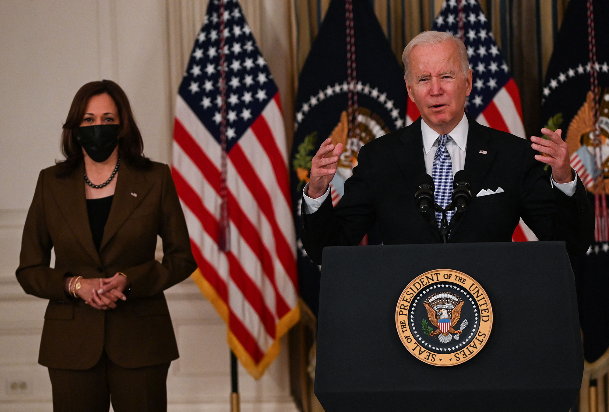 Joe Biden with Kamala Harris in the bsckground.