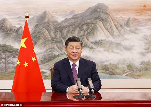 In July China carried out a hypersonic weapon test with a missile fired at five times the speed of sound (president Xi Jinping pictured)