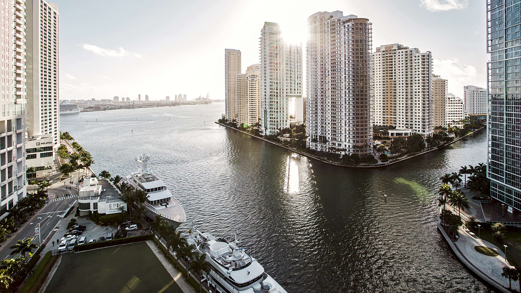 Sunrise above high-rise buildings next to the coast of Miami, Florida.