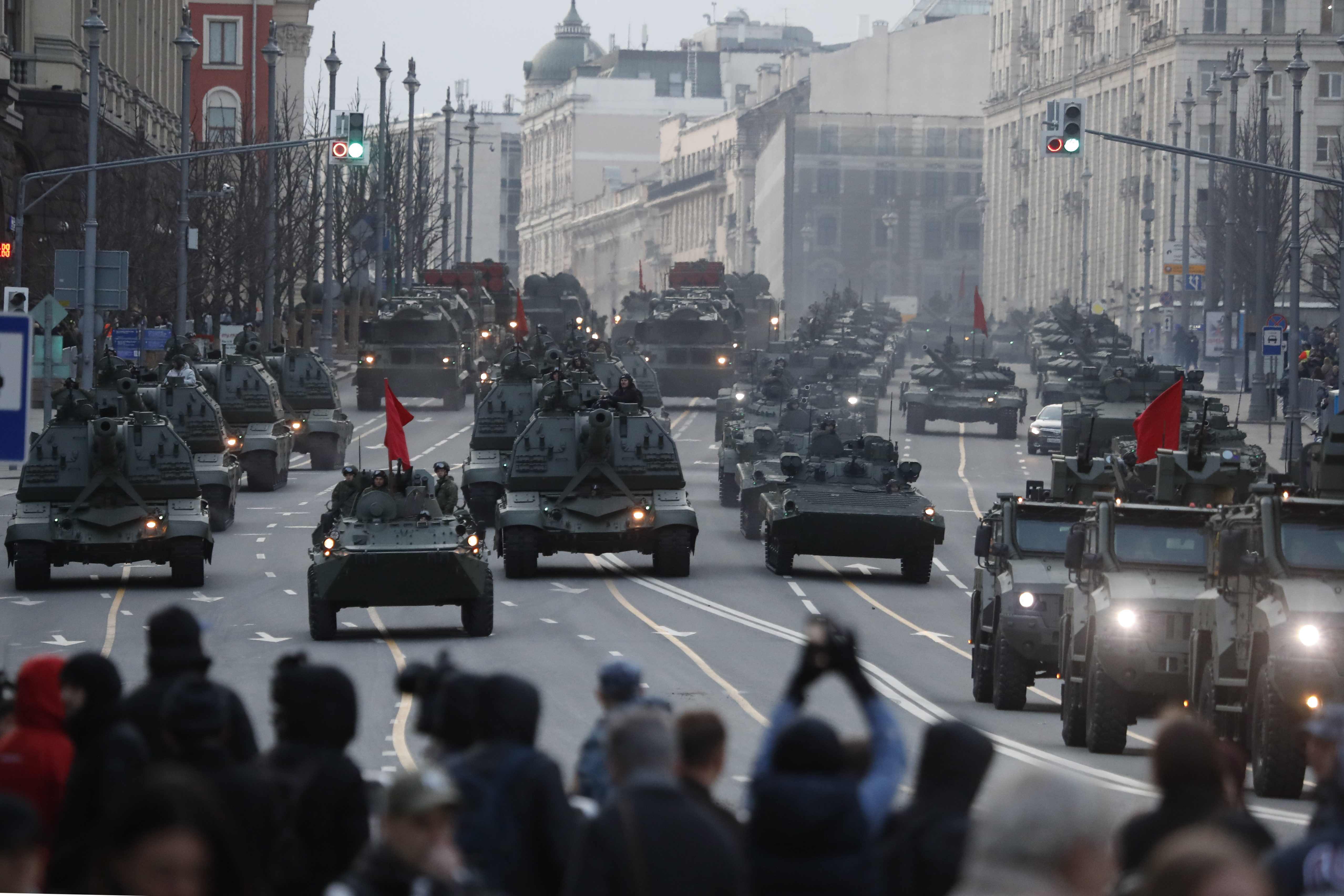 Russian self-propelled artillery vehicles, tanks and military vehicles roll along Tverskaya street toward Red Square during a rehearsal for the Victory Day military parade