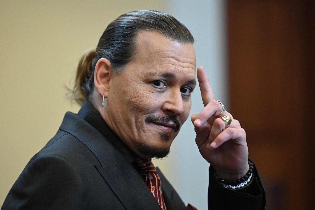 In this file photo taken on May 3, 2022 US actor Johnny Depp looks on during a hearing at the Fairfax County Circuit Courthouse in Fairfax, Virginia.