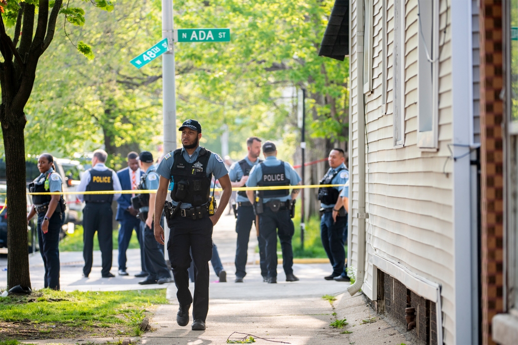Chicago police work the scene of a fatal drive-by shooting in the 4800 block of South Ada Street, in the Back of the Yards neighborhood, Tuesday, May 10, 2022 in Chicago.