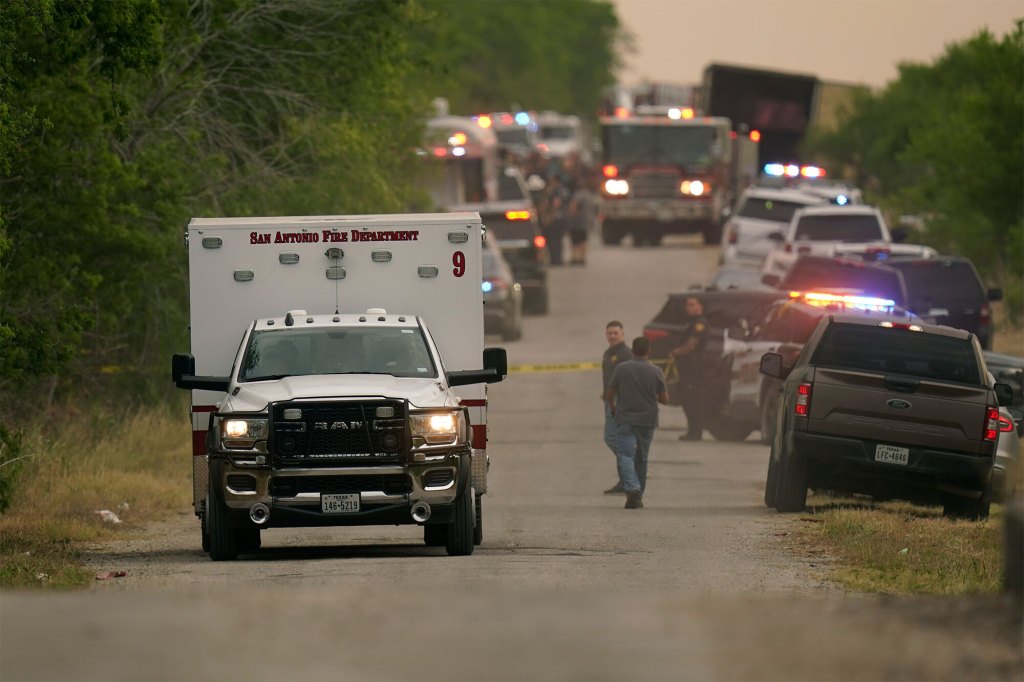 An ambulance leaves the scene of the gruesome incident. 