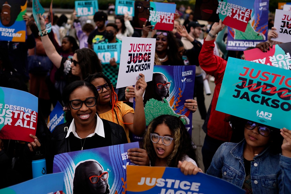People celebrate the historic Senate confirmation of Judge Ketanji Brown Jackson.