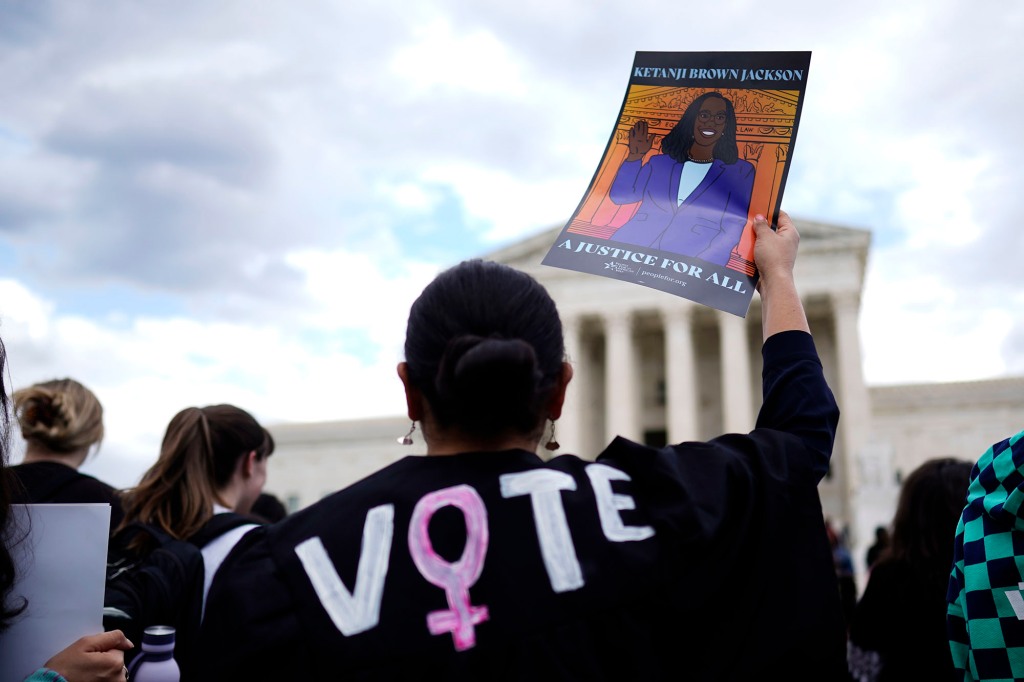 People celebrate the historic Senate confirmation of Judge Ketanji Brown Jackson.