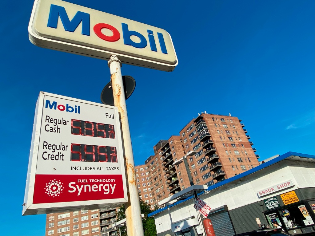 Mobil gas station sign showing high gas prices