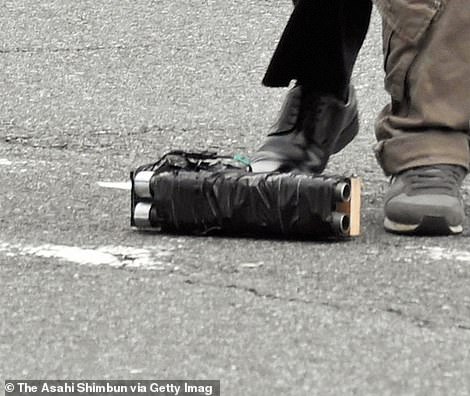 The weapon used to shoot Abe appears to be a homemade double-barrelled shotgun, made by strapping two pieces of pipe to a piece of wooden board