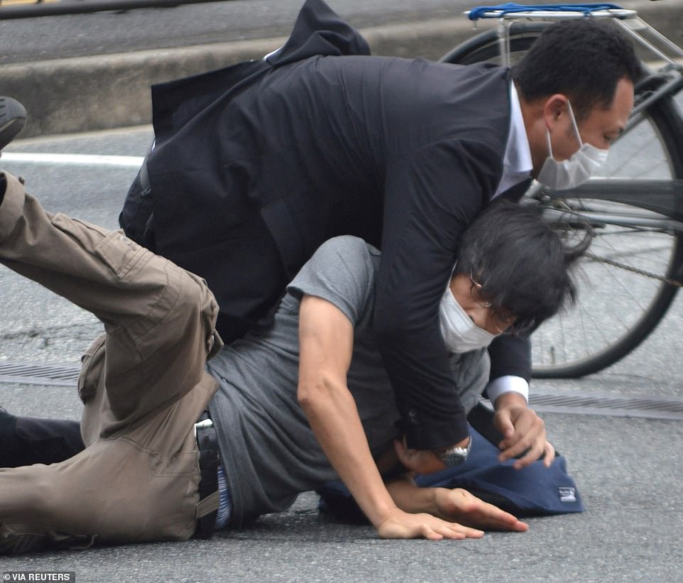 Tetsuya Yamagami, 41, a military veteran, was tackled by Abe's security detail and then arrested by police on suspicion of attempted murder. The motivation for the attack is unknown