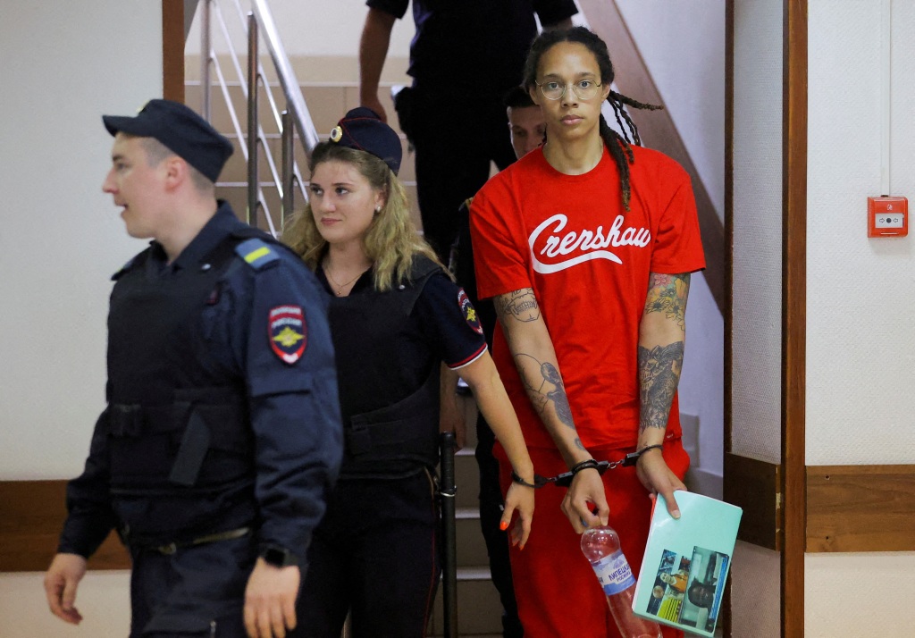 Brittney Griner is escorted before a court hearing in Khimki, outside Moscow, Russia on July 7, 2022.  