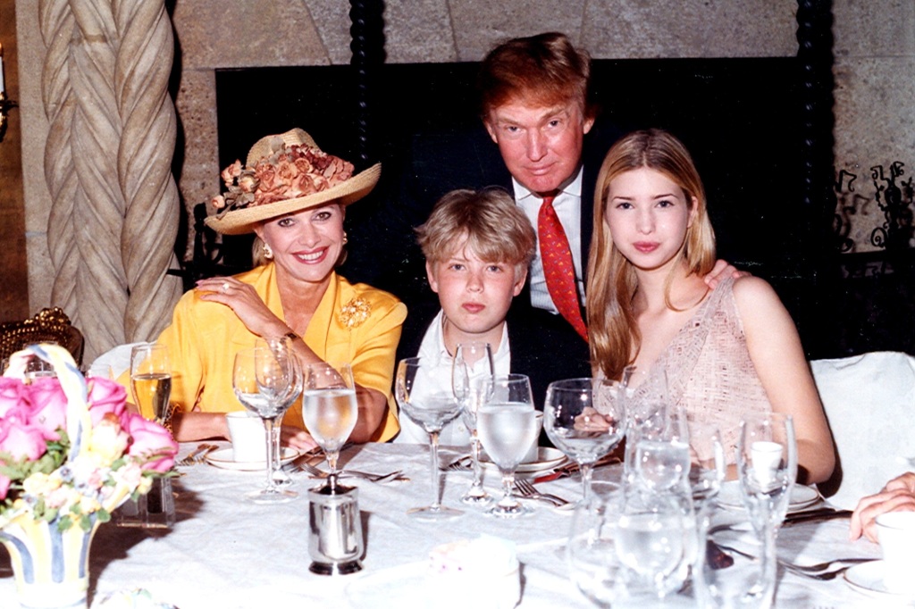 Family portrait of, from left, socialite Ivana Trump, her son Eric Trump, her former husband Donald Trump, and her daughter Ivanka Trump as they sit at a table at the Mar-a-Lago estate, Palm Beach, Florida, 1998.