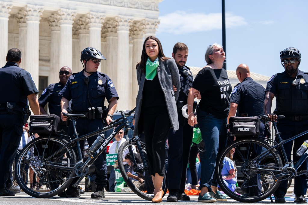 Rep. Alexandria Ocasio-Cortez and several other lawmakers were escorted away from a pro-abortion protest outside of the Supreme Court building on July 19, 2022.