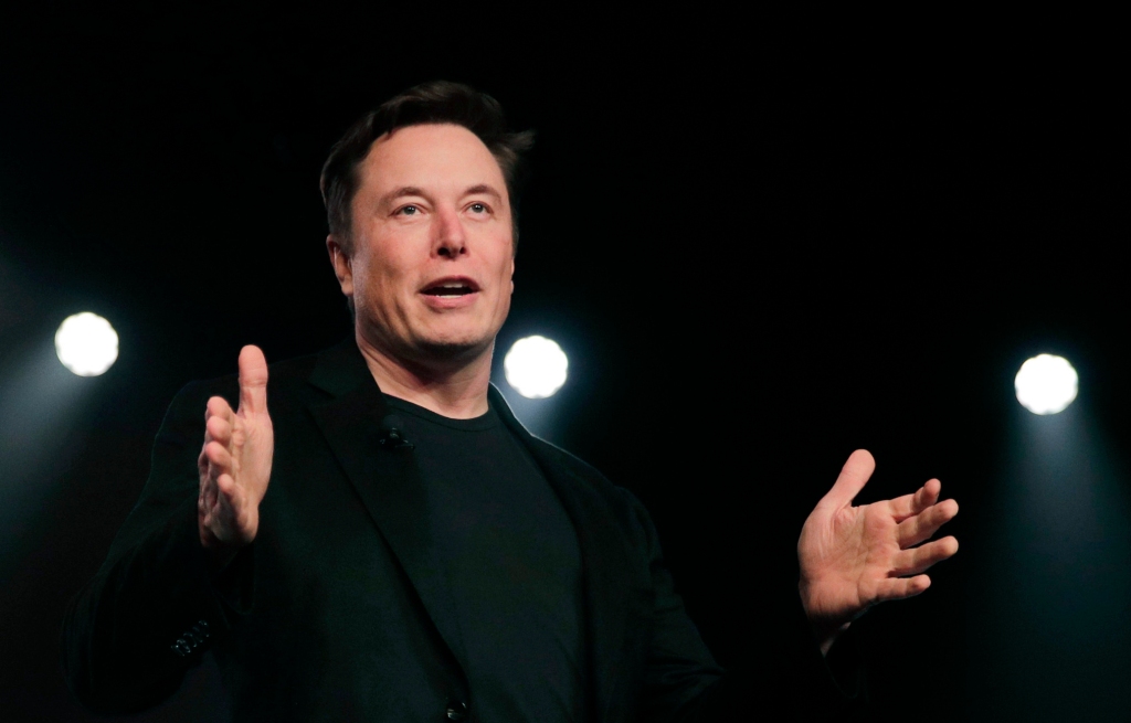 Tesla CEO Elon Musk speaks before unveiling the Model Y at Tesla's design studio in Hawthorne, Calif., March 14, 2019. 
