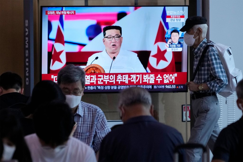 People watch a TV showing an image of North Korea leader Kim Jong Un, during a news program at the Seoul Railway Station in Seoul, South Korea, Thursday, July 28, 2022. Kim warned he's ready to use his nuclear weapons in potential military conflicts with the United States and South Korea, state media said, as he unleashed fiery rhetoric against rivals he says are pushing the Korean Peninsula to the brink of war.