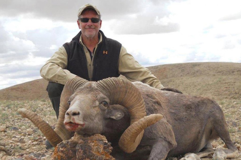 Lawrence &ldquo;Larry&rdquo; Rudolph pictured in front of a dead animal