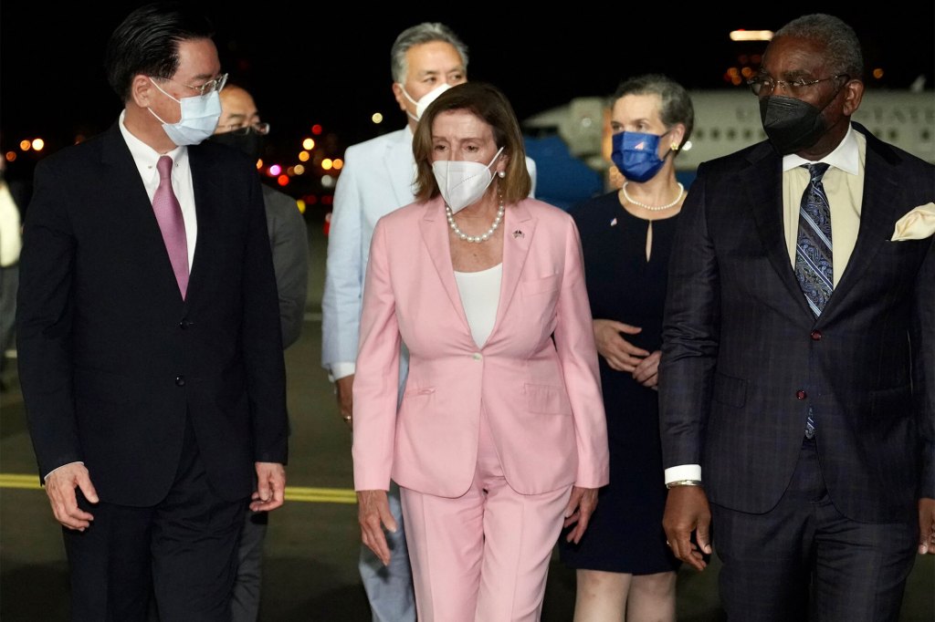 August 2, 2022, Taipei, Taiwan: U.S. House Speaker NANCY PELOSI, center, (D-CA) and U.S. Rep GREGORY MEEKS, right, (D-NY) Chair of the House Foreign Affairs Committee, with the rest of her delegation, are welcomed by Taiwan Foreign Minister JOSEPH WU (left) at Taipei Songshan International Airport. Beijing has voiced serious objections over the visit. Pelosi is the highest-ranking American official in 25 years to visit the self-ruled island claimed by China. (Credit Image: © Taiwan Foreign Ministry via ZUMA Press Wire)