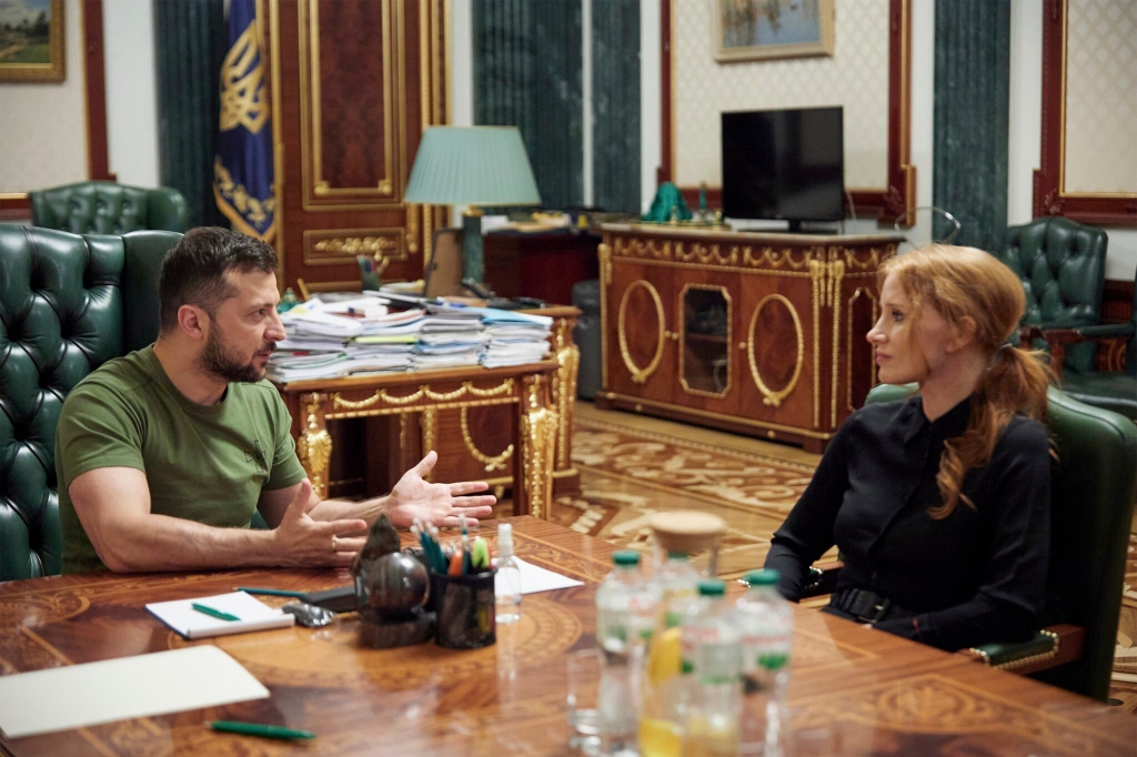 In this photo provided by the Ukrainian Presidential Press Office, Ukrainian President Volodymyr Zelenskyy, left, and American actress Jessica Chastain talk in Kyiv, Ukraine, Aug. 7, 2022. 