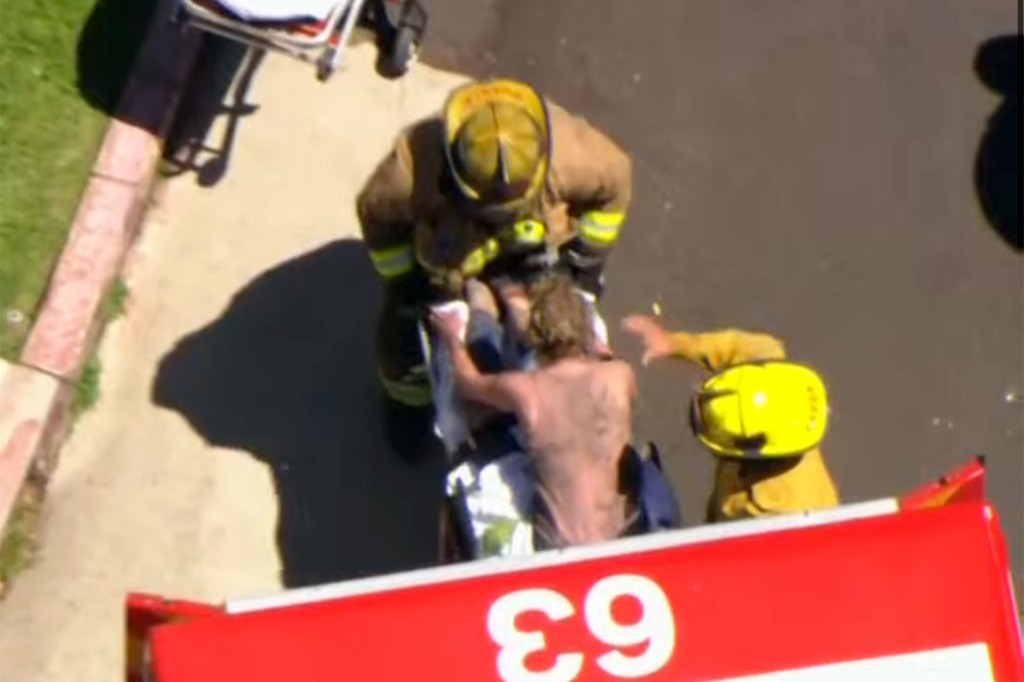 Anne Heche on stretcher.