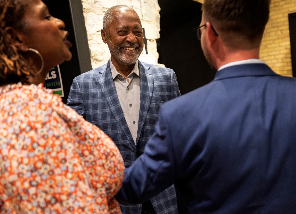 Minnesota 5th Congressional District candidate Don Samuels is greeted by supporters at his primary election night watch party on August 9, 2022.