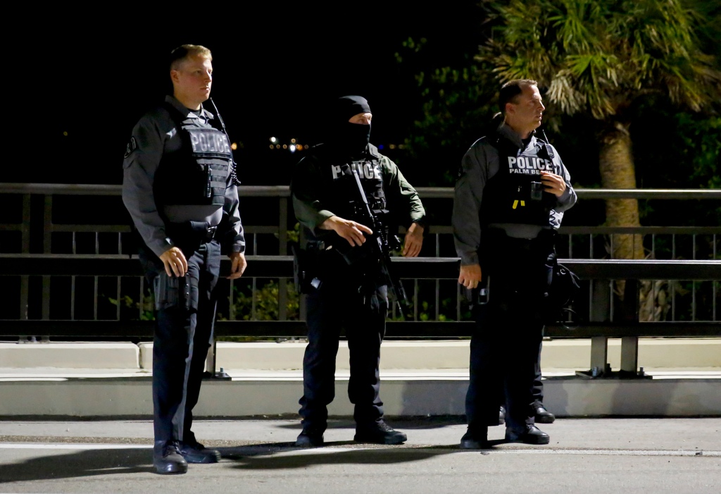 alm Beach police officers keep watch near the home of former President Donald Trump at Mar-A-Lago on August 8, 2022 in Palm Beach, Florida. 