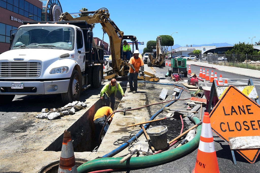 Construction workers on a road