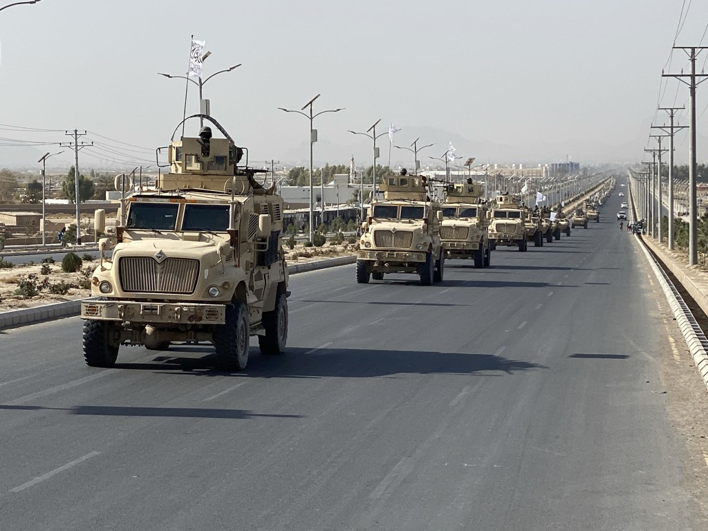 Taliban holds a military parade with equipment captured from U.S. army in Kandahar.