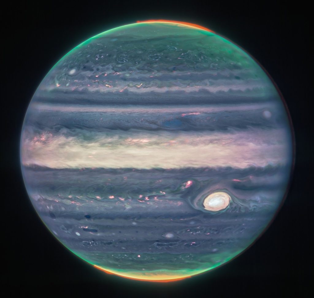 Jupiter&rsquo;s Great Red Spot, a storm big enough to swallow Earth, stands out brightly alongside countless smaller storms.