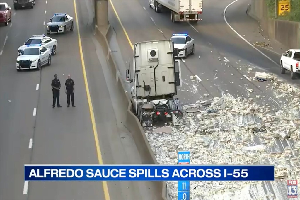 The truck slammed into a retention wall on I-55 -- causing the sauce to explode all across the highway.