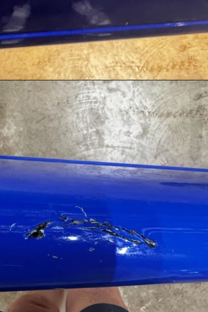 A boat is broken where the alligator bit it.