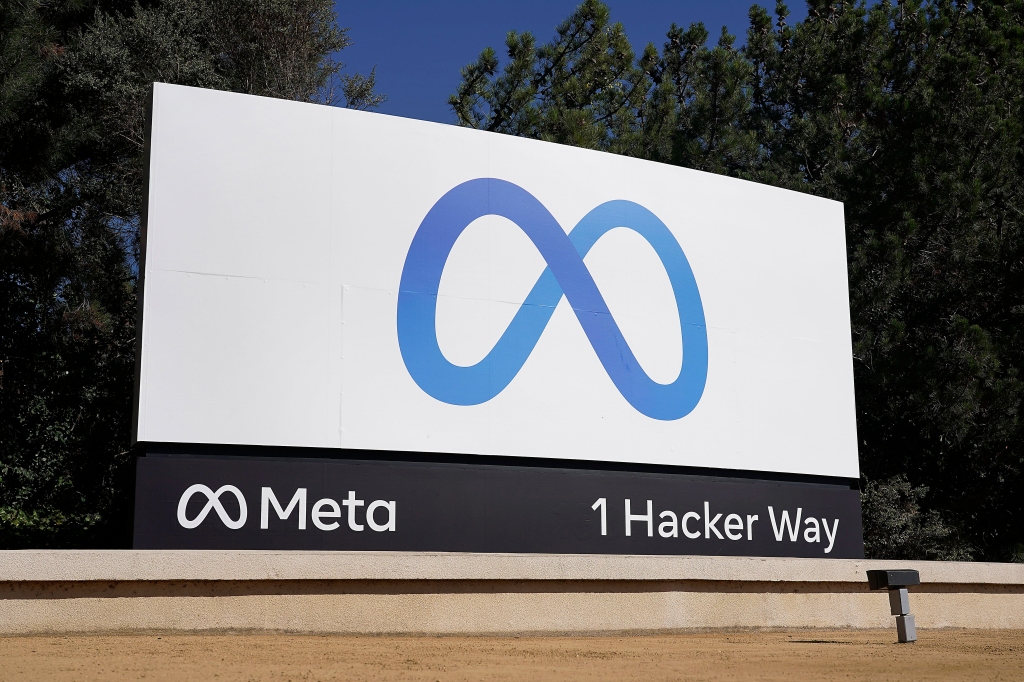 FILE - Facebook's Meta logo sign