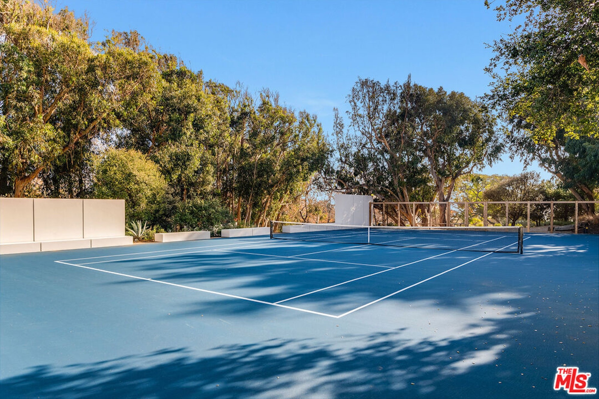 The tennis court.