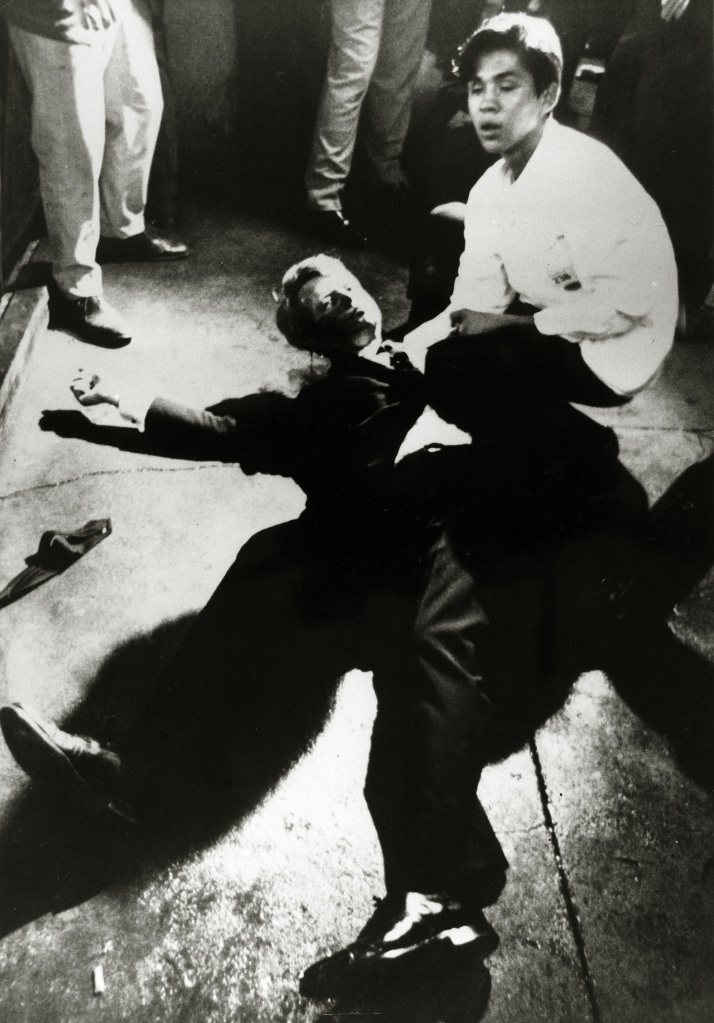 Democratic Senator Robert Kennedy lies sprawled on the floor at the Ambassador Hotel after being shot.