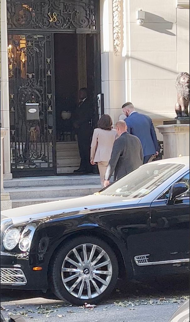 Gov. Kathy Hochul walks into apartment building