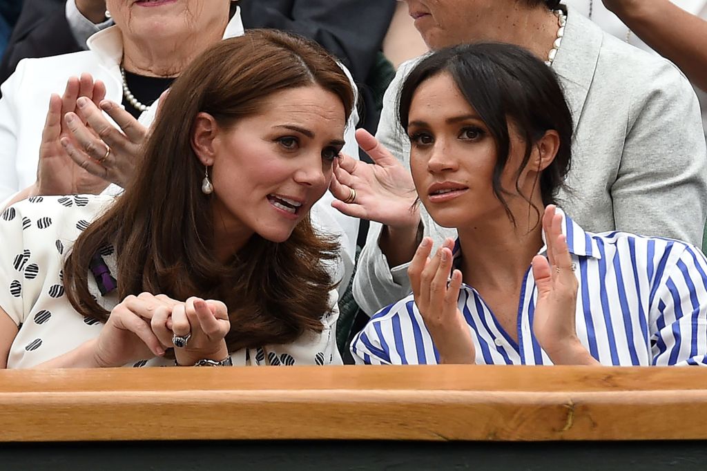 The Duchess of Cambridge and The Duchess of Sussex watch the Womens final at the Wimbledon Championships, Wimbledon, London, UK, on the 14th July 2018.