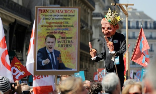 Tens of thousands stage anti-Macron protest in Paris - EgyptToday